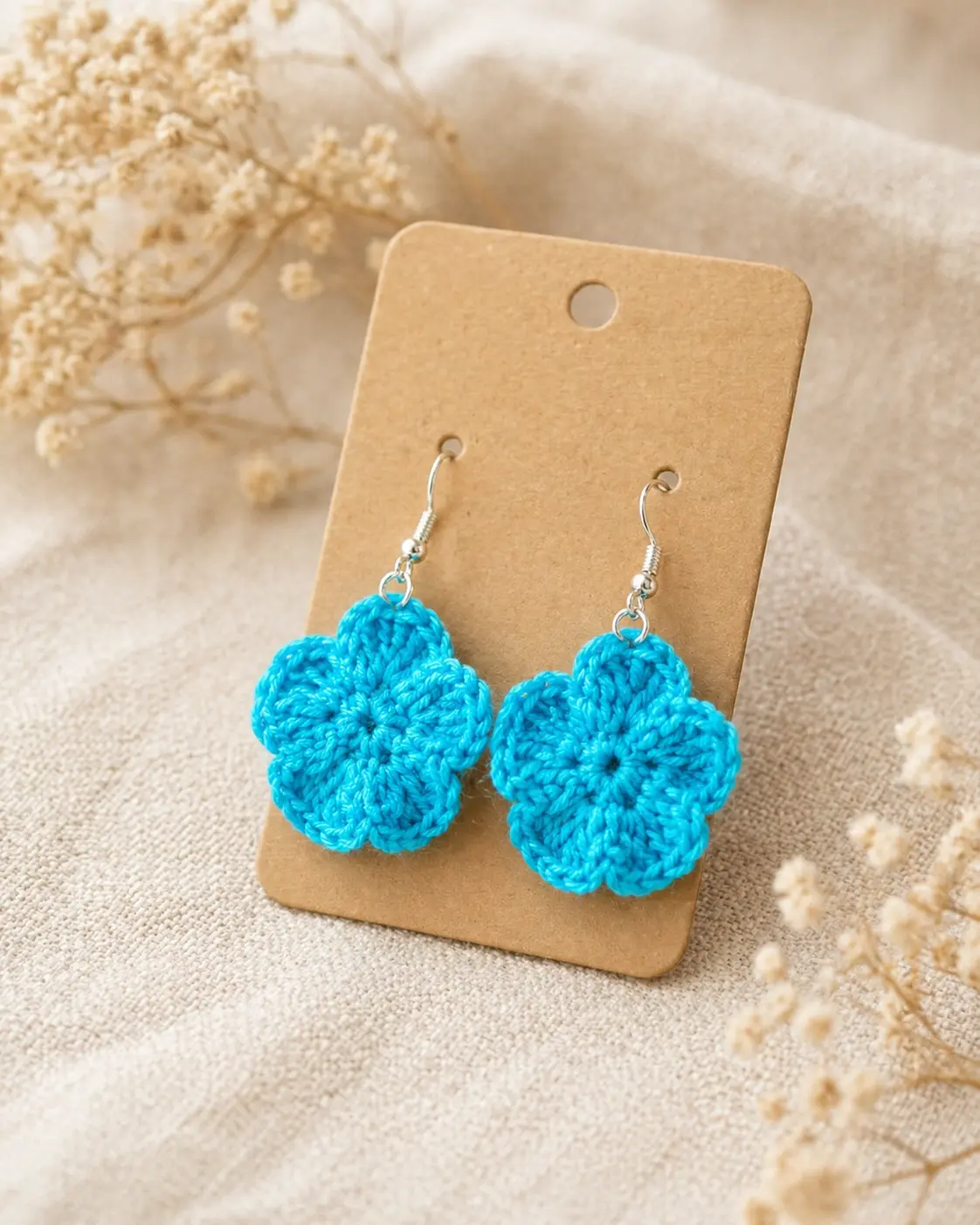 Boucles d’oreilles fleur bleue