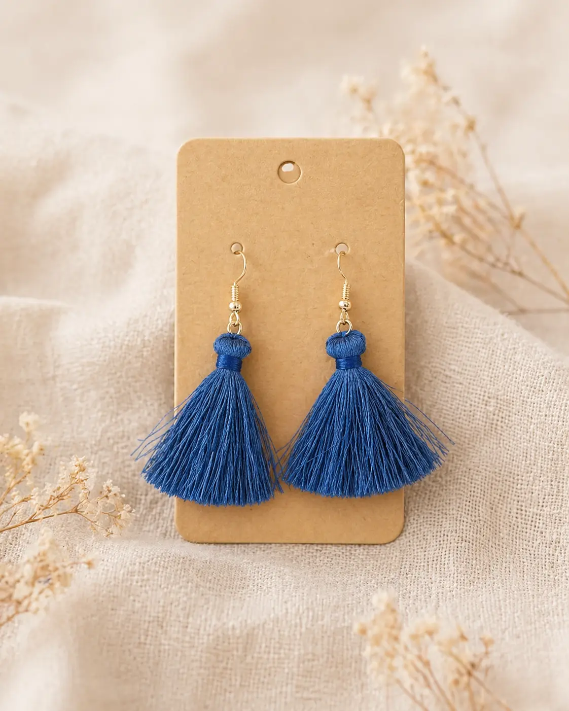 Boucles d’oreilles pompon bleues