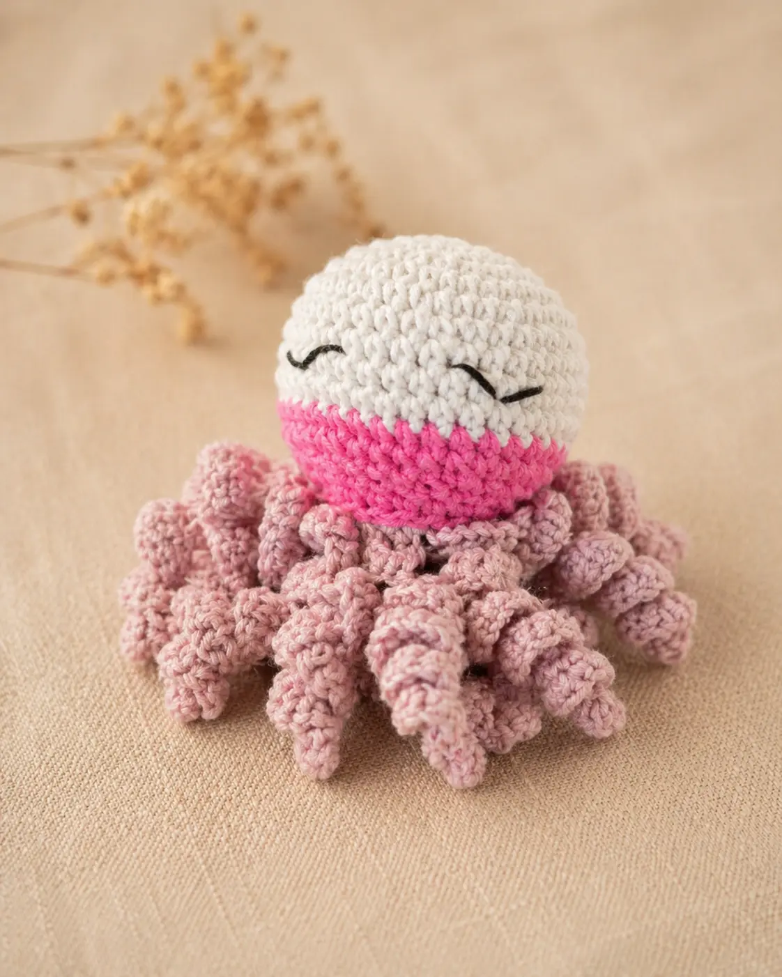 Doudou pieuvre rose et blanc