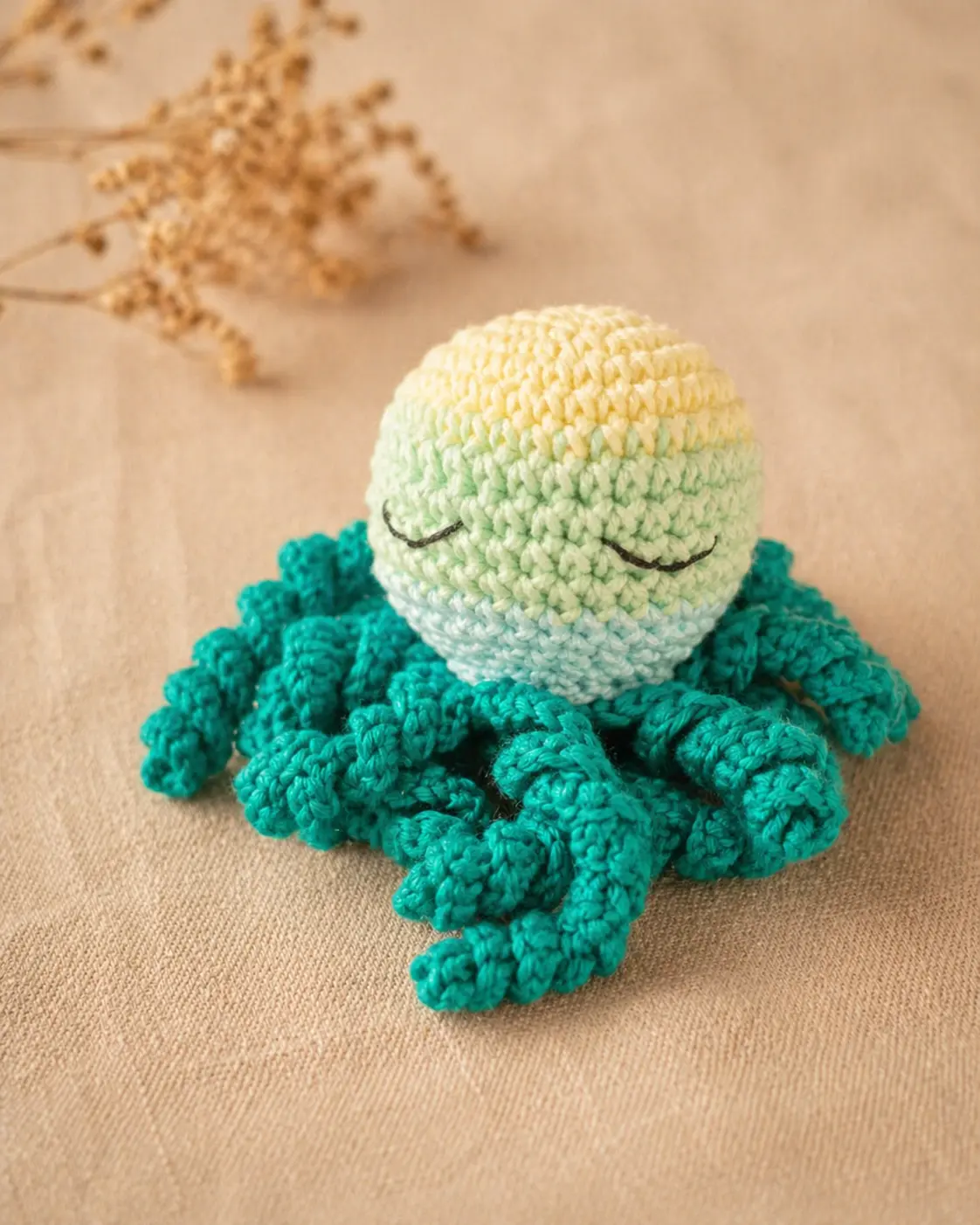 Doudou pieuvre vert et jaune
