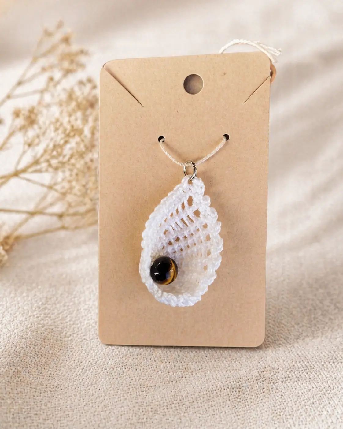 Pendentif coquillage avec perle naturelle